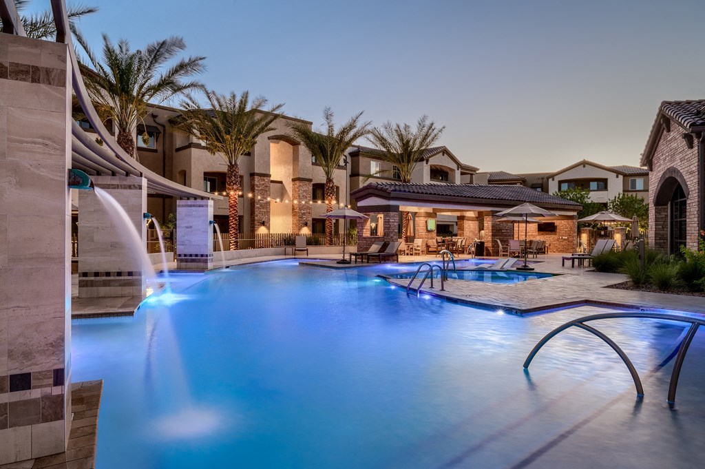 a swimming pool at night at the resort at longacre