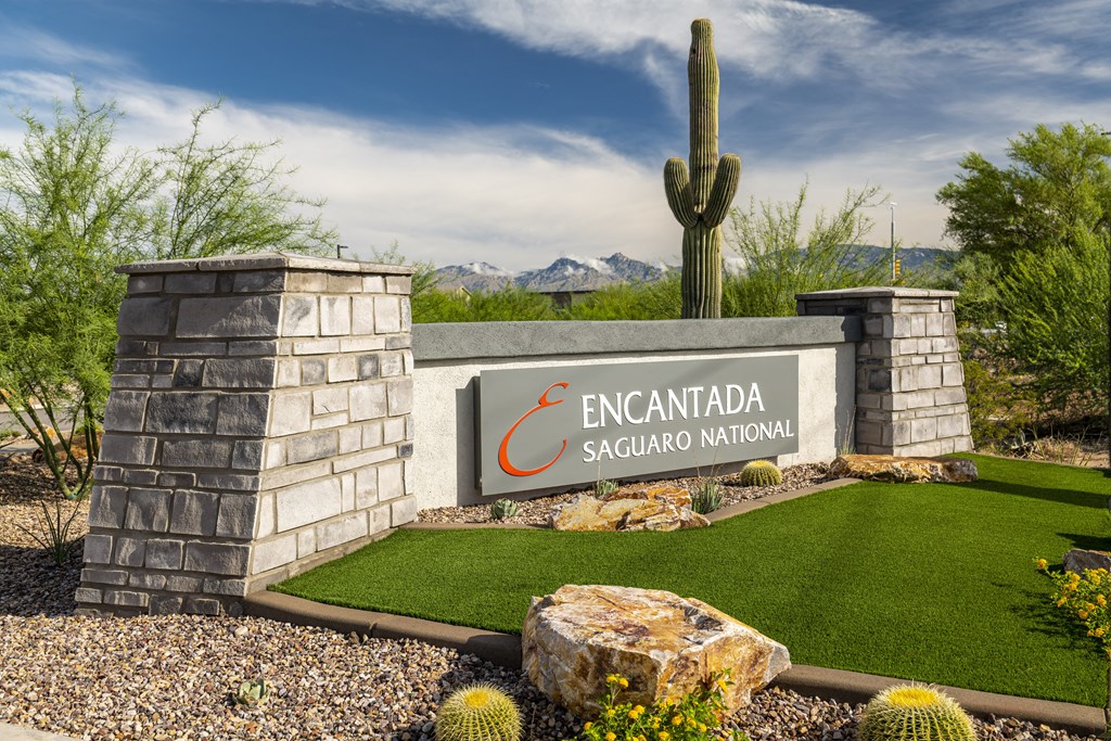 a view of the sign at the entrance to the encantada saguaro national