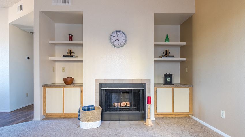 Brittany court living room with cozy fireplace - Photo Gallery