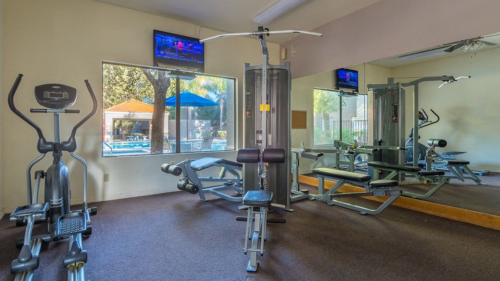 Estancia fitness center with weight machines and fitness equipment