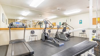 The Springs fitness center with weight stations and fitness equipment - Photo Gallery 34