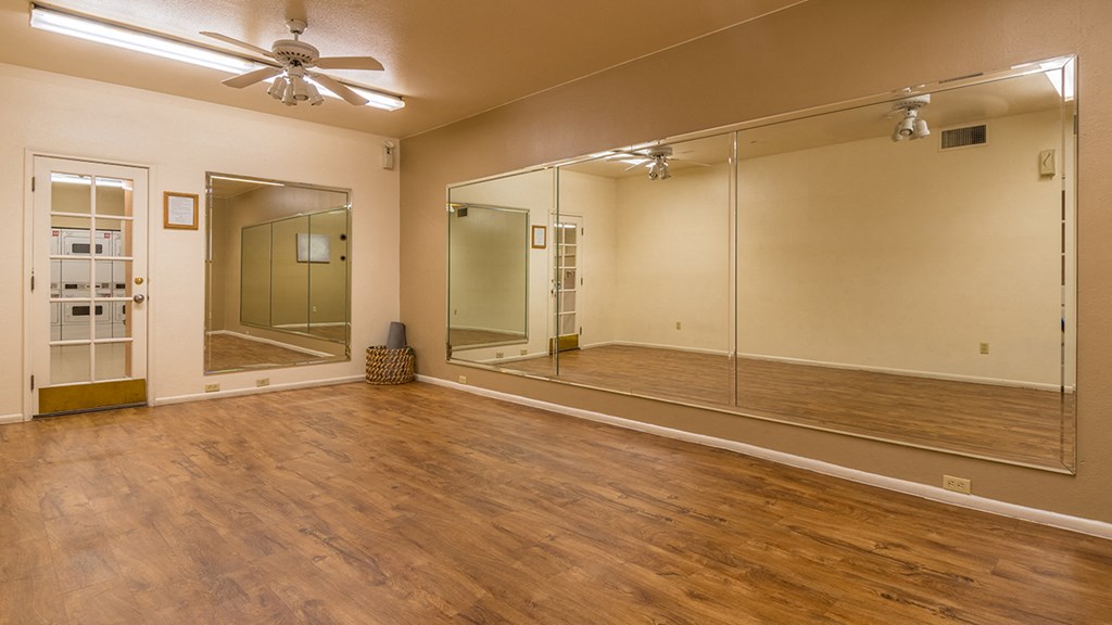 Canyon oaks spacious fitness room with ceiling fan