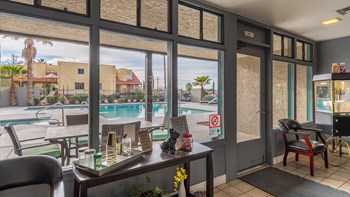 Camino Seco Village clubhouse with nice views of outside pool and relaxation area - Photo Gallery 24