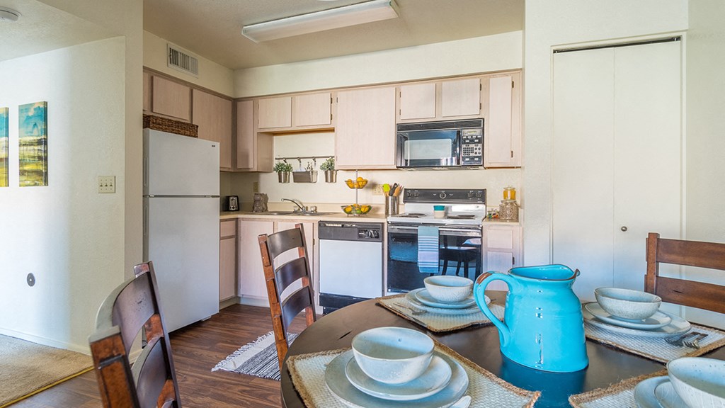 Villas at Montebella spacious kitchen with plenty of cabinetry and dining area near