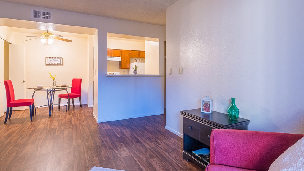 Enclave rooms with nice wood flooring and cozy lounging areas