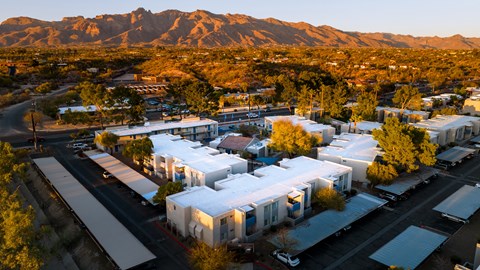 A small town with a mountain in the background.