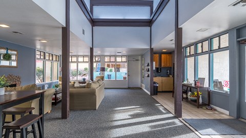 Open clubhouse with comfortable lounge areas.