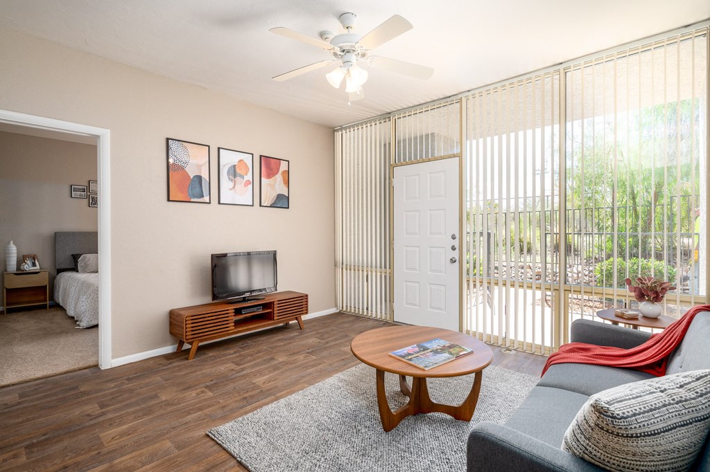 a living room with a couch and a tv