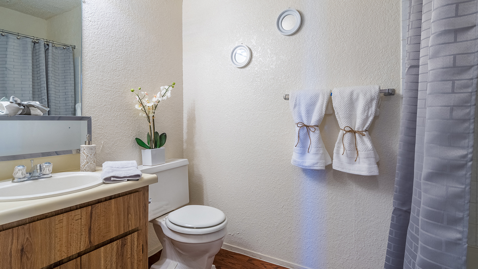 Somerpointe bathroom with vanity sink and large tub