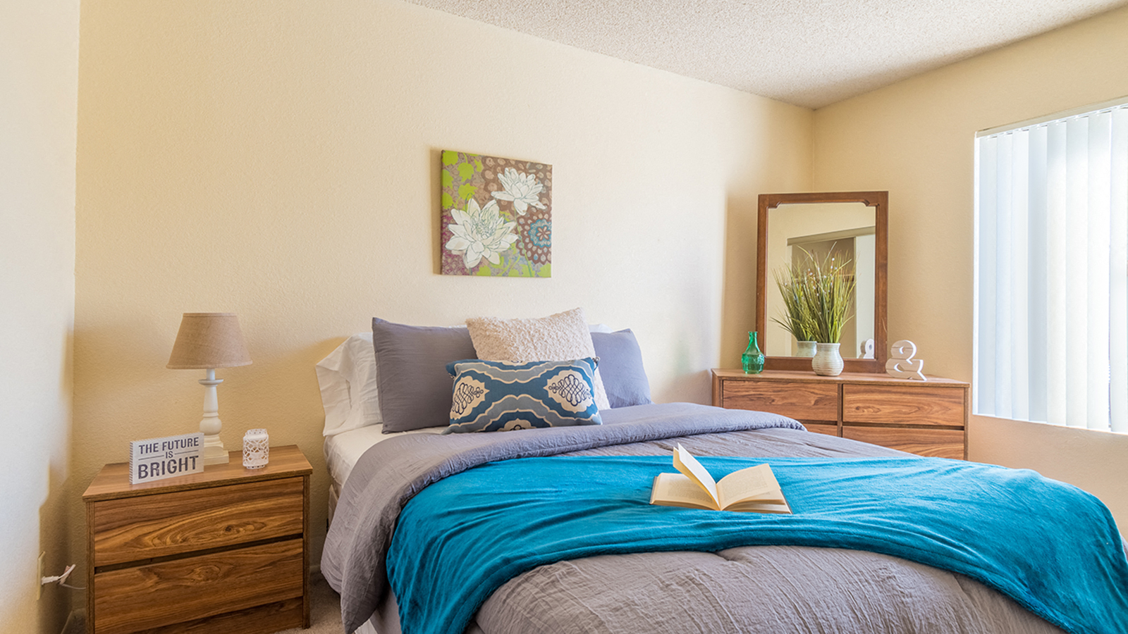 Sycamore Creek Spacious Bedroom with plenty of natural light, and drawers