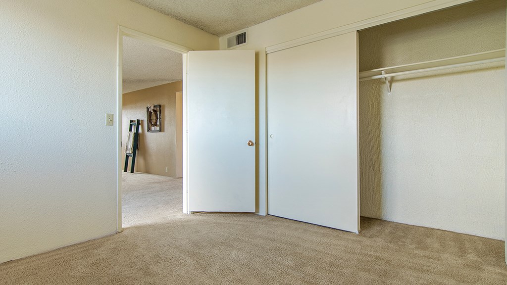 Cottonwood Creek room with large closet near the doorway.
