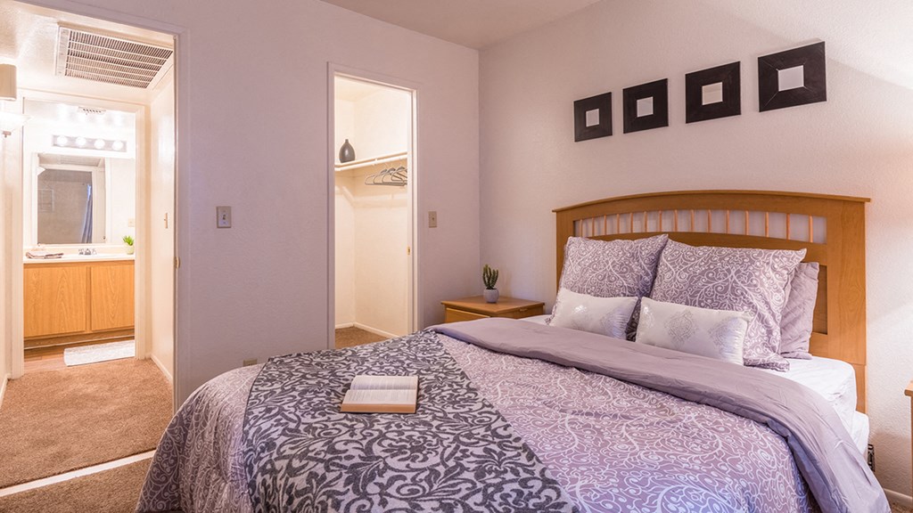 Cantera spacious bedrooms with bathrooms and nice lighting