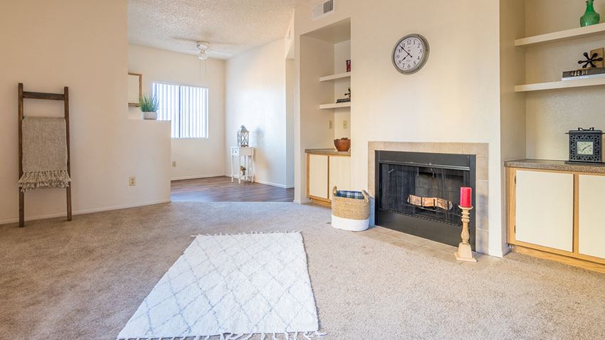 Brittany court living room with cozy fireplace - Photo Gallery