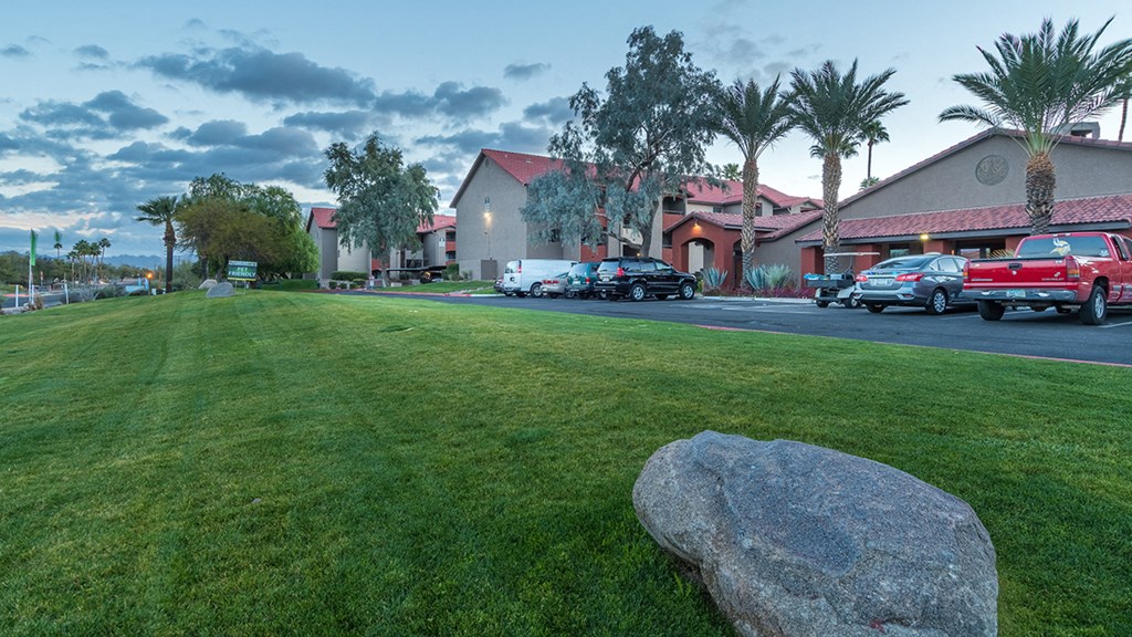Enclave outside view with lush landscape and large grassy areas