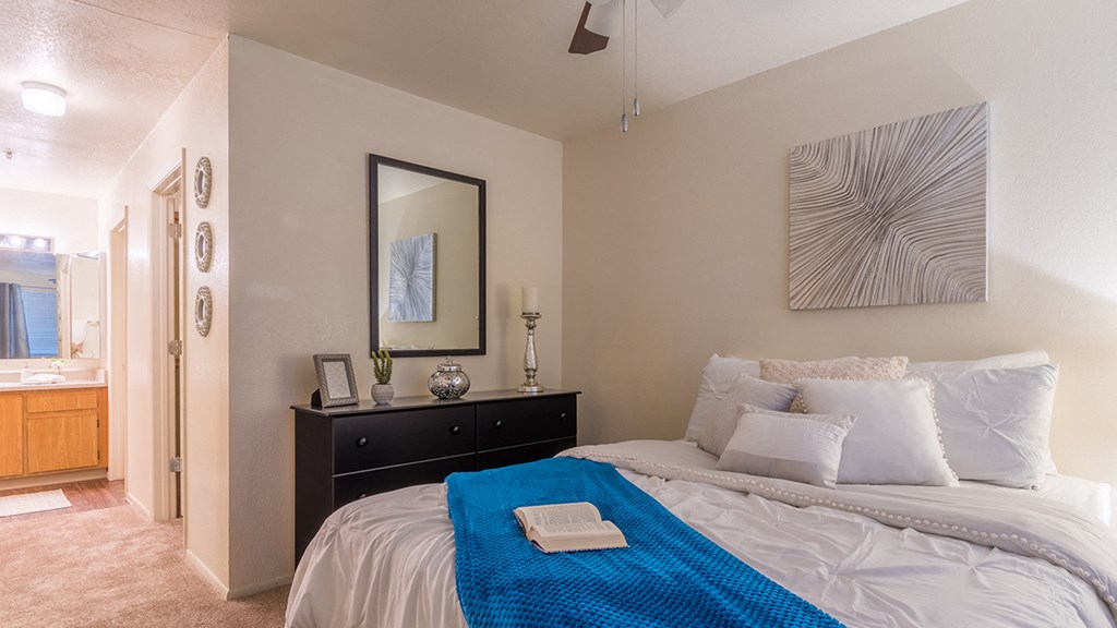 Estancia master bedroom with bathroom and nice lighting