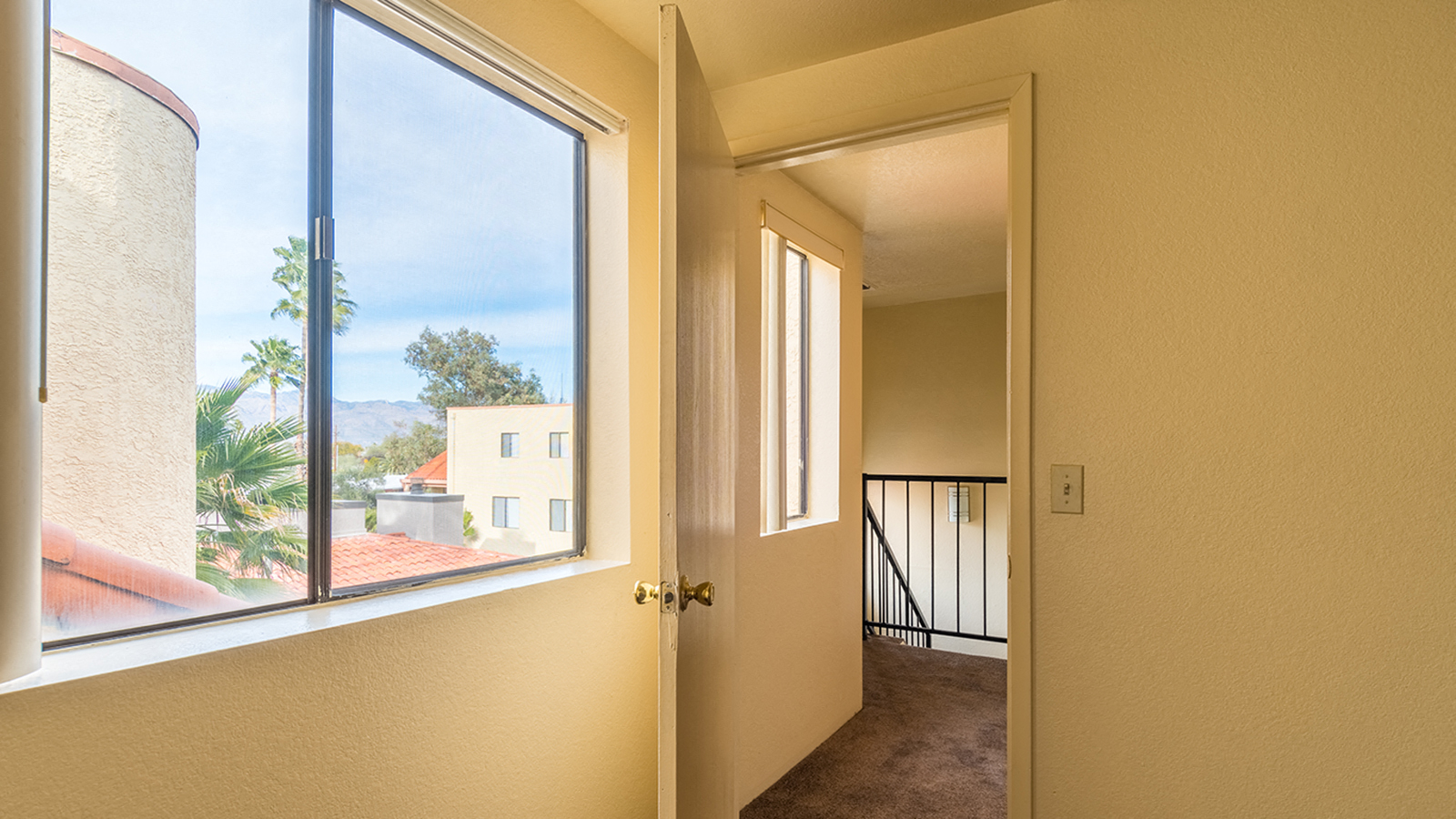 view from top floor bedroom with mountains in distance