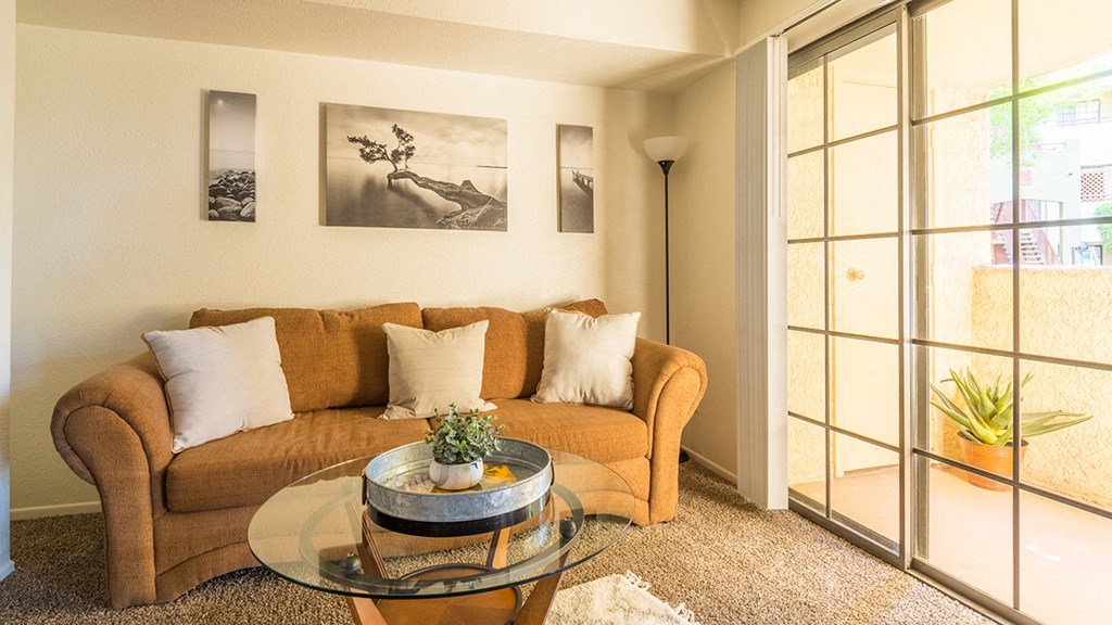 El Encanto spacious living room with sliding glass doors and plenty of natural light