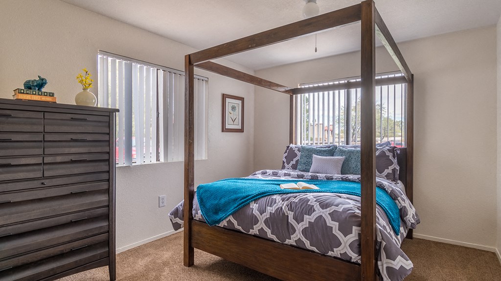 Cantera spacious master bedroom with nice natural lighting