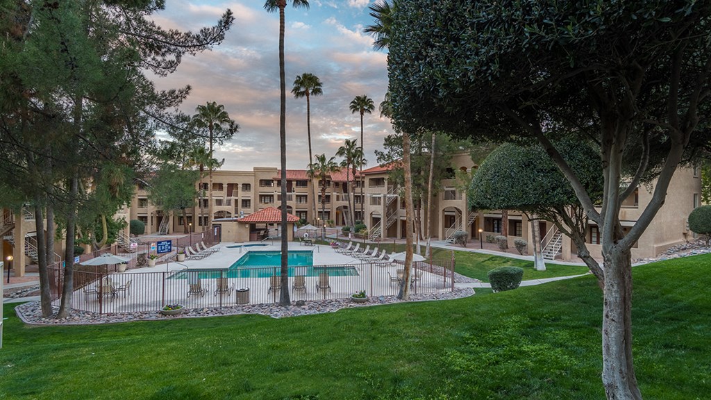 Foothills outside view with nice lush grass and trees throughout
