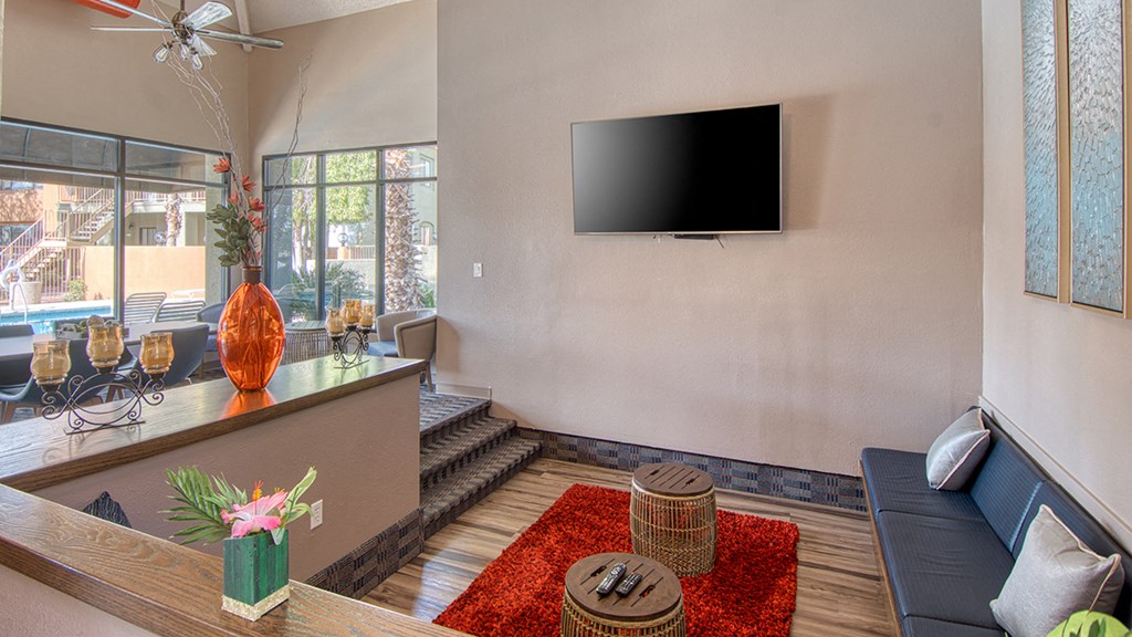 Ridgepointe clubhouse with nice lounge area and table