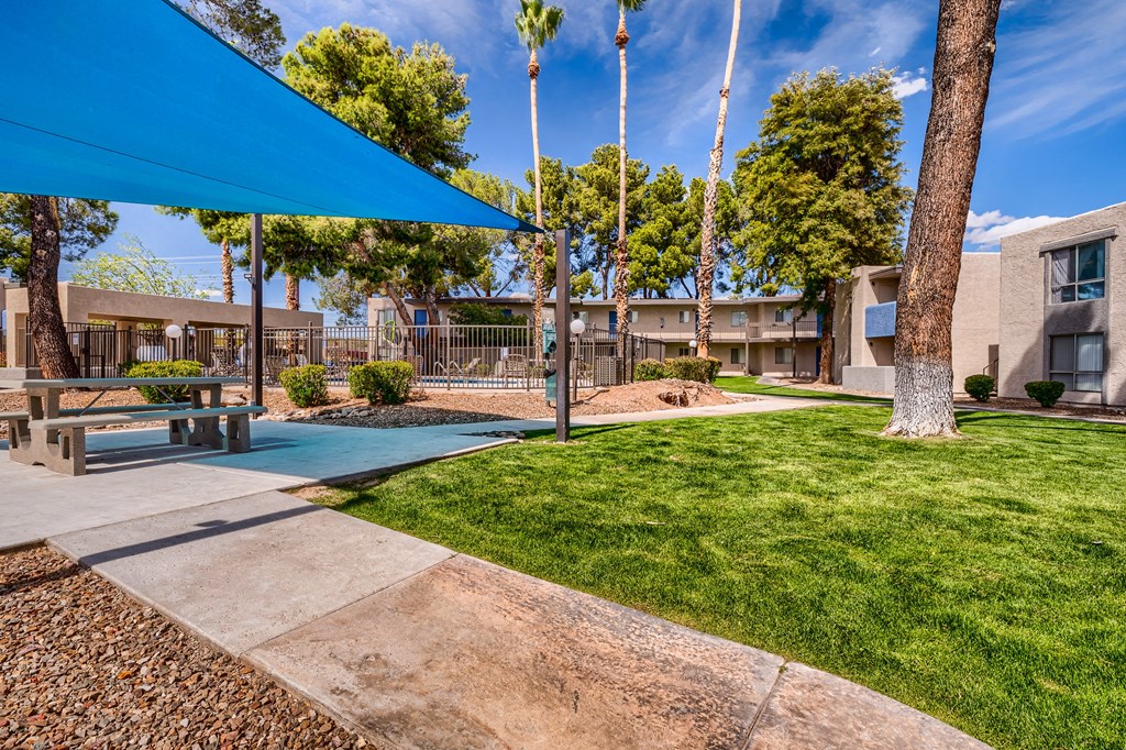 our apartments have a spacious courtyard with picnic tables and grass