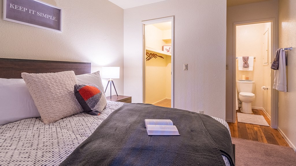 Enclave spacious bedroom with bathroom and nice lighting