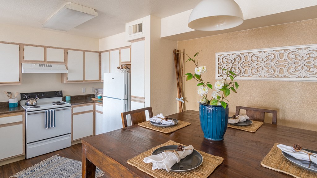 Cantera spacious kitchen with nice dining space