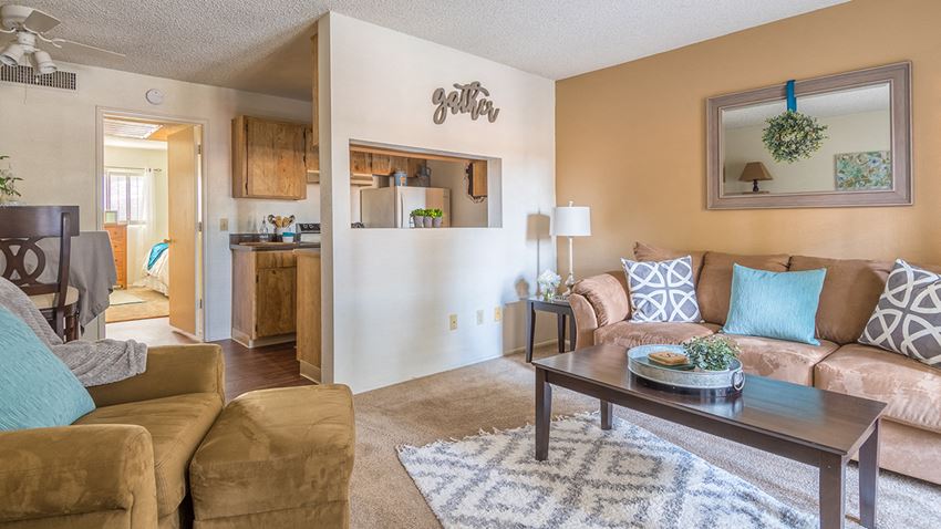 Foothills living room with carpet flooring and couches for relaxation - Photo Gallery