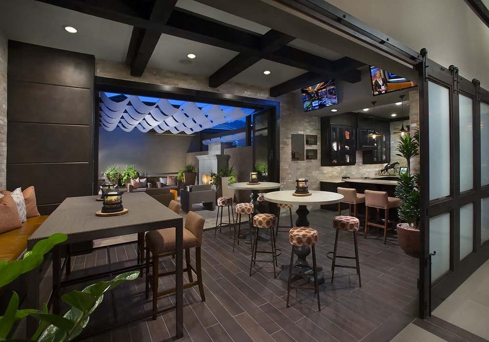 a restaurant with tables and chairs and a large window