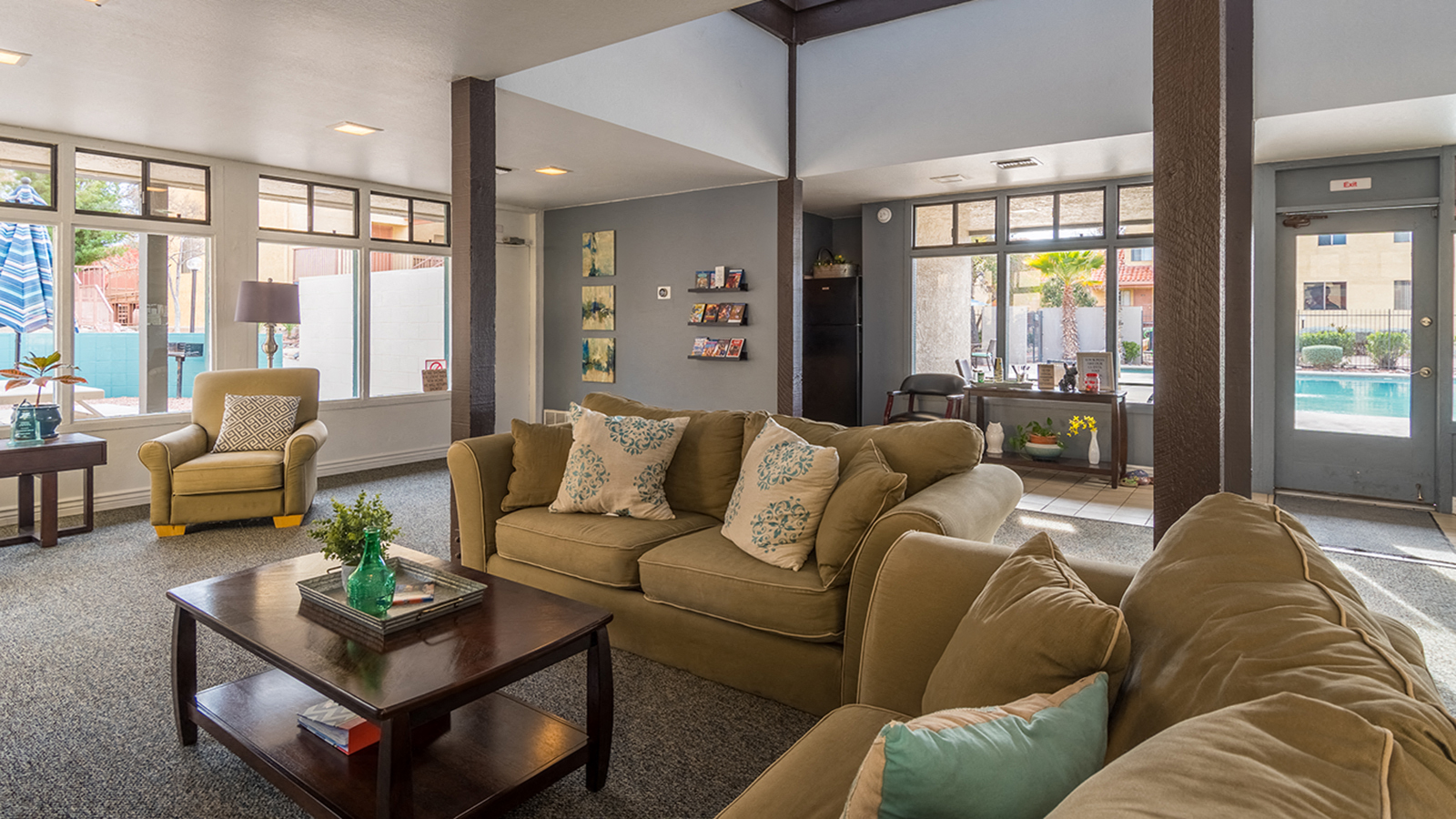 a living room with couches and a coffee table