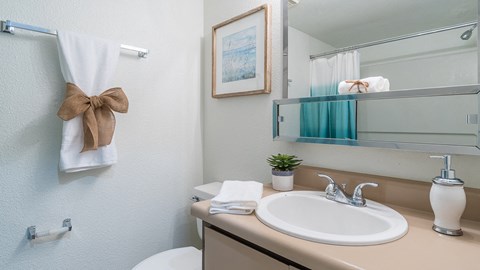 El Encanto bathroom with shower tub combo and a nice sink
