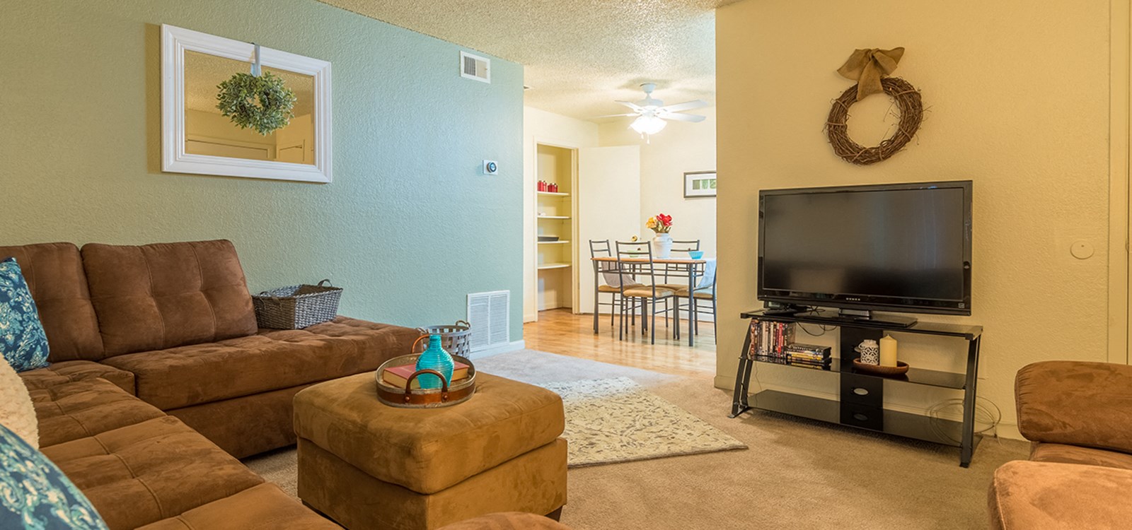 a living room with a couch and a television