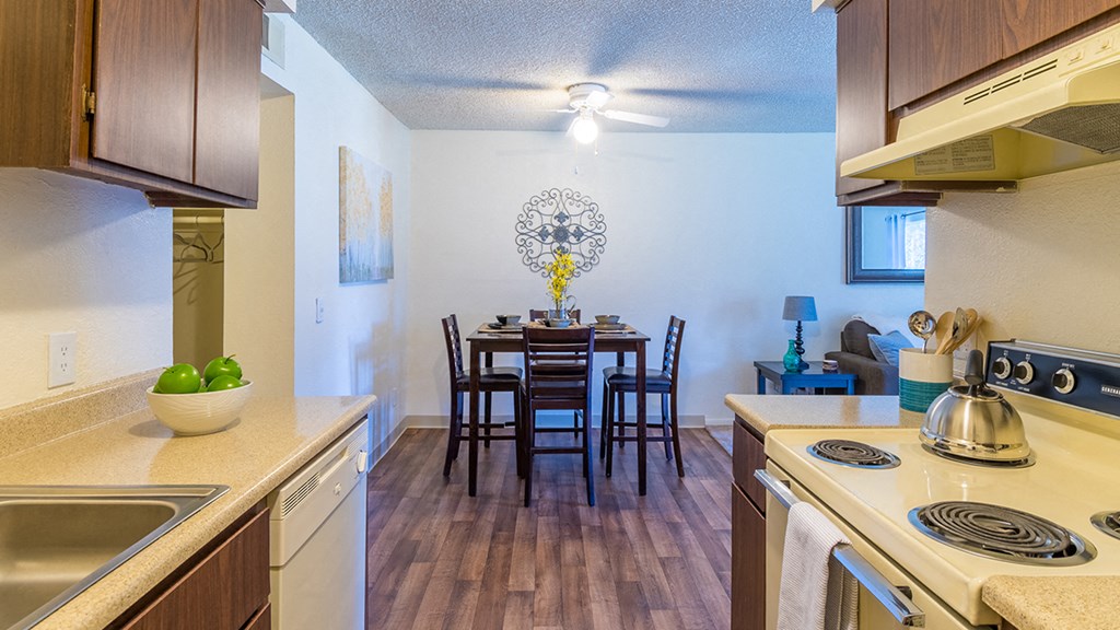 The Srpings view of kitchen and dining area with wood flooring
