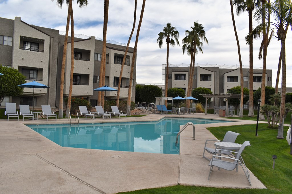 El Encanto pool view with plenty of lounging and relaxation space.