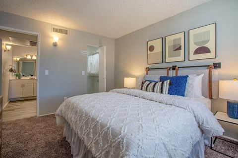 Modern apartment spacious bedroom.