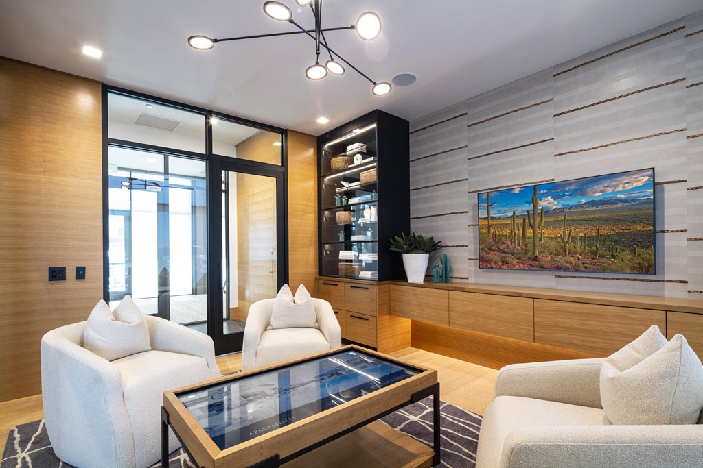 a living room with couches and a coffee table