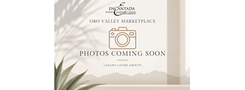 A poster announcing that photos for the Oro Valley Marketplace are coming soon.