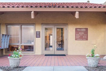 Rio Vista entrance to clubhouse with nice path and glass doors - Photo Gallery 6