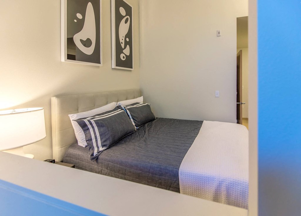 a bed or beds in a room at 132nd street