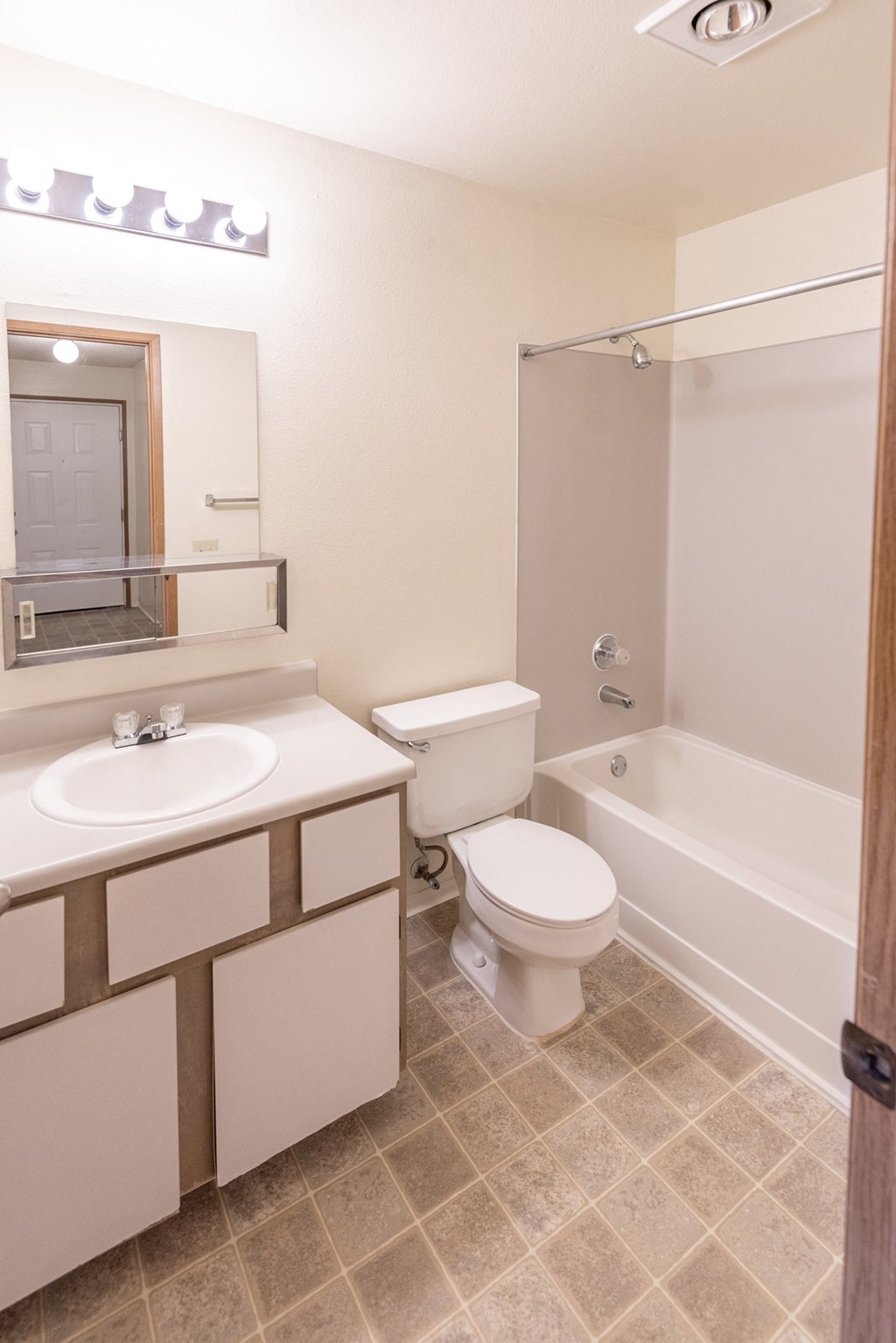 a bathroom with a sink toilet and bathtub