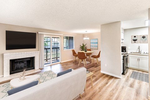 A living room with a fireplace and a couch.