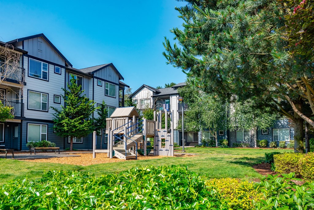 the preserve at ballantyne commons apartments with a playground and trees