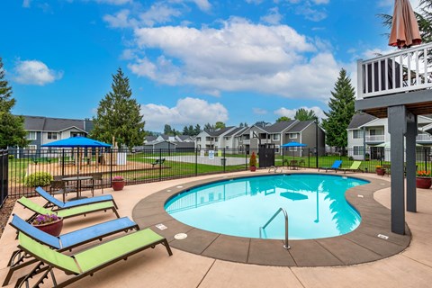 our apartments have a resort style pool with lounge chairs