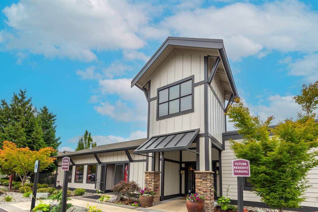 a picture of the front of the building with a blue sky in the background