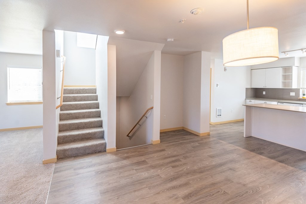 a view of the kitchen and living room from the dining room