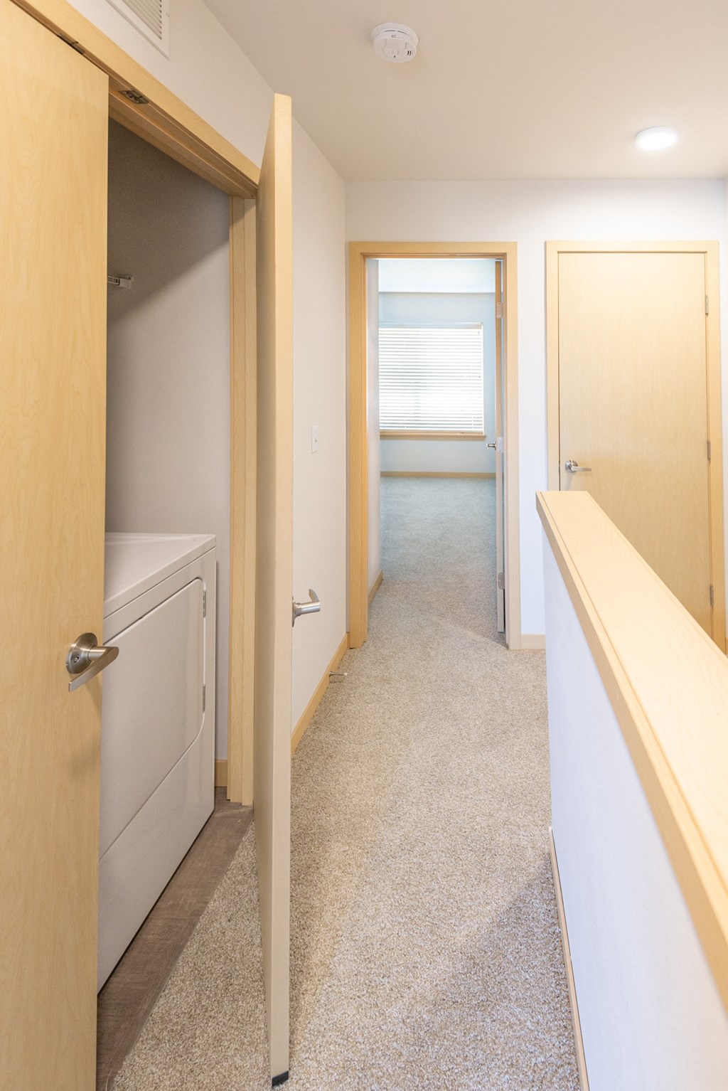a laundry room with a washer and dryer