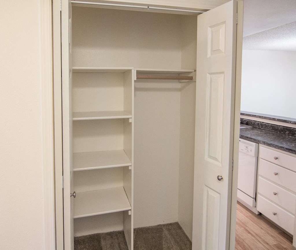 a walk in closet in a 555 waverly unit
