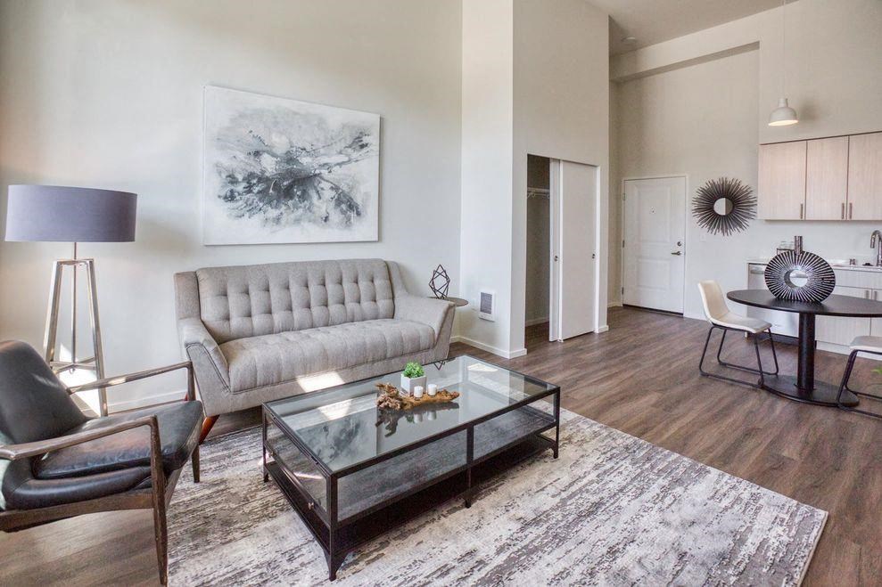 a living room with a couch and a table