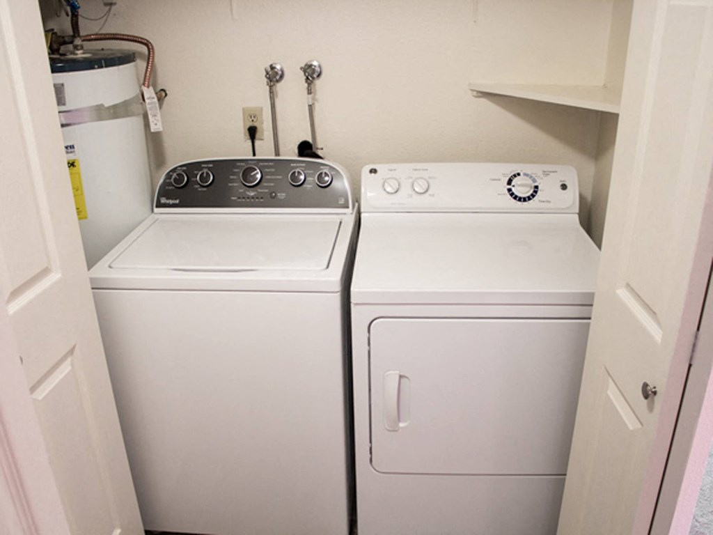 a washer and dryer in the laundry room