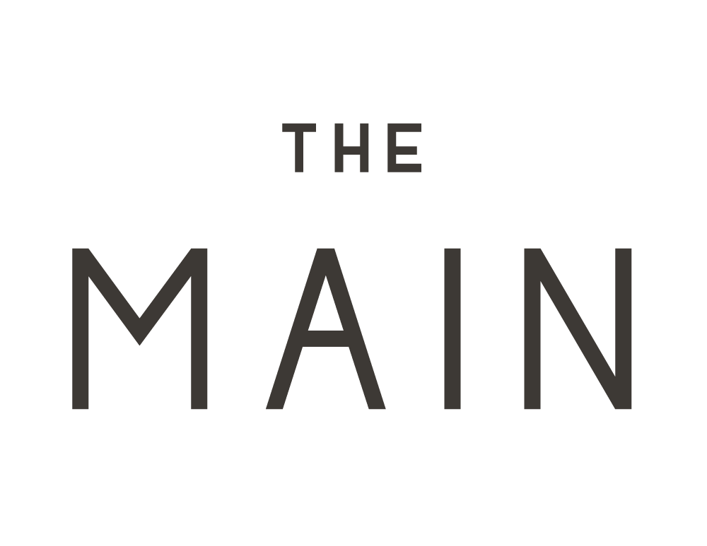 The Main Apartments logo